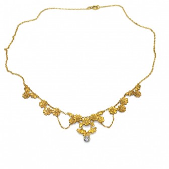 Bijoux anciens - Collier draperie en or jaune et diamant , vers 1890
