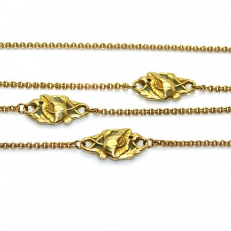 Bijoux anciens - Sautoir Art-Nouveau en or jaune et motifs floraux