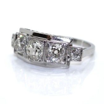 Bijoux anciens - Bague Art Déco jarretière diamants