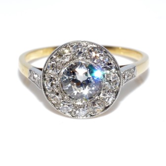 Bijoux anciens - Bague entourage diamants 