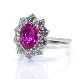 Bijoux récents - Bague entourage en rubis et diamants